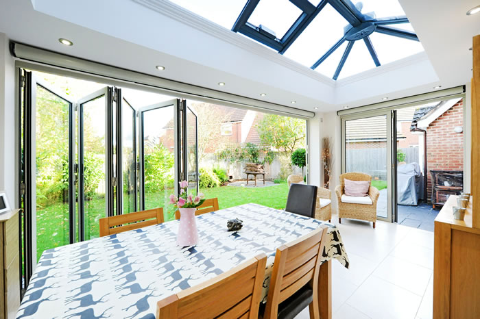 Orangery system with Aluminium bi folding doors in Farrow and Ball French Grey