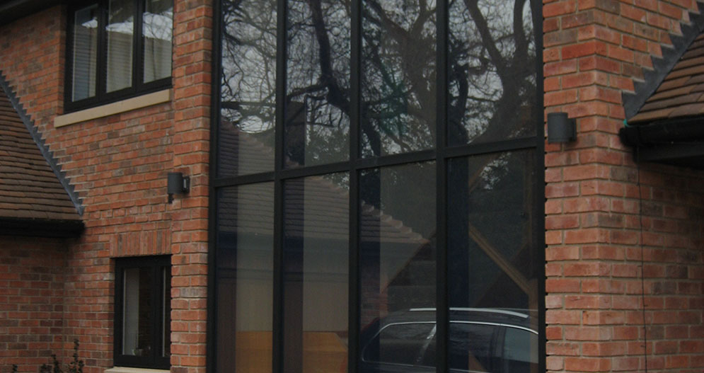 Aluminium windows  with feature glass panel