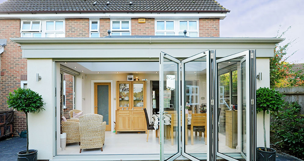 Orangery System featuring Aluminium Bi Foldings Doors - Rococo