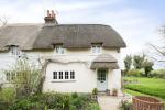 Storm Evolution Windows have been used to maintain the charm and elegance of this 100 year old cottage