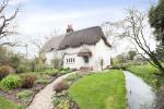 Storm Evolution Windows have been used to maintain the charm and elegance of this 100 year old cottage