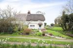 Storm Evolution Windows have been used to maintain the charm and elegance of this 100 year old cottage