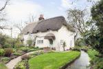 Storm Evolution Windows have been used to maintain the charm and elegance of this 100 year old cottage